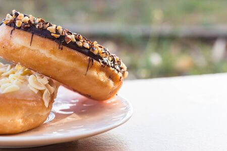 Donuts on wooden backgroundの写真素材