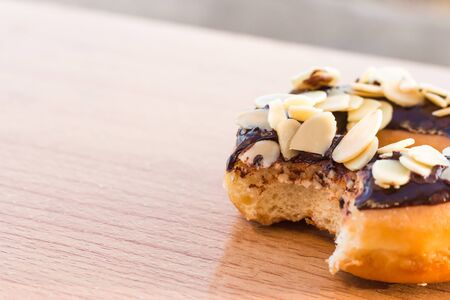 Donuts on wooden background