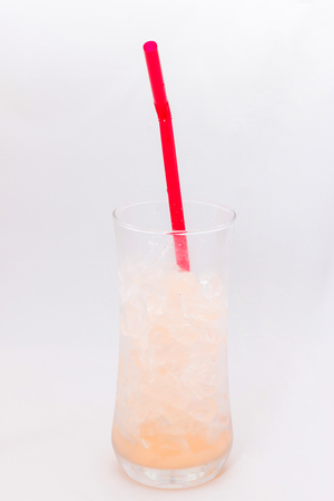 empty iced thai milk tea, isolated on whiteの写真素材