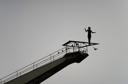 Shadow woman on high placeの写真素材