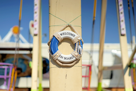 Friendly invitation to enter the ship, welcome to the boat.の写真素材