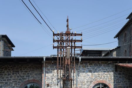 Old abandoned and useless factory building, electrical installation at an abandoned factoryの写真素材