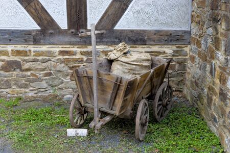 Ancient weathered wooden cartの写真素材