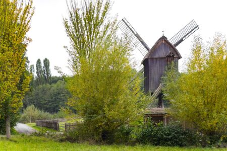 Ancient wooden windmill in Germanyの写真素材