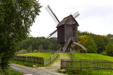 Ancient wooden windmill in Germanyの写真素材
