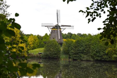 Ancient wooden windmill in Germanyの写真素材