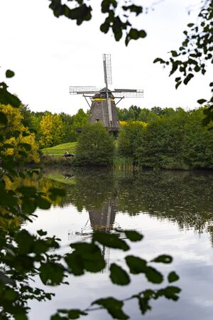 Ancient wooden windmill in Germanyの写真素材