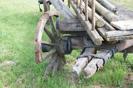 Discarded horse or ox carts with broken wheelsの写真素材