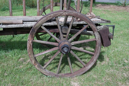 Discarded horse or ox carts with broken wheelsの写真素材