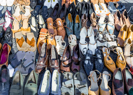 Used women's shoes offered at the flea marked, garage sale
の写真素材