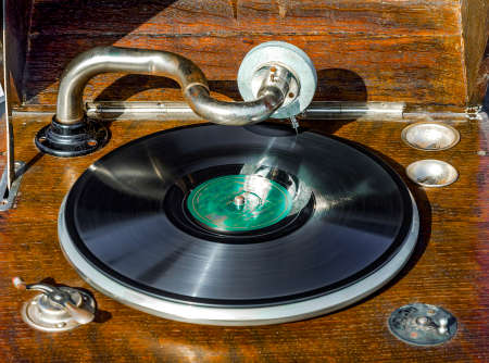 Antique 100 year old record player with recordの写真素材
