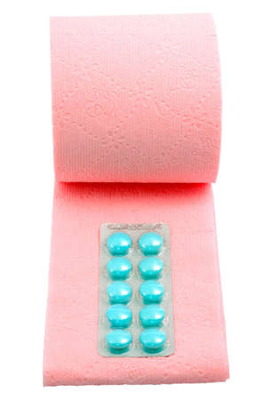 Toilet paper and pillsの写真素材