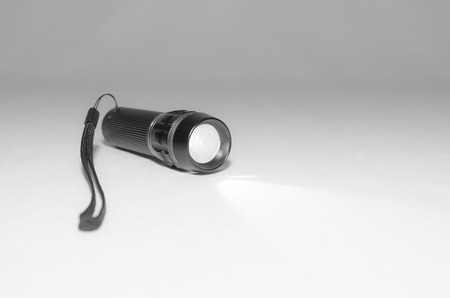 black small led flashligt isolatedの写真素材