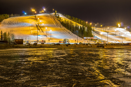 Ski village at night with slope lights, Himos, Finlandのeditorial素材