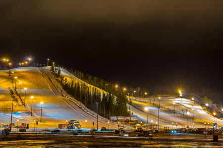 Ski village at night with slope lights, Himos, Finlandのeditorial素材