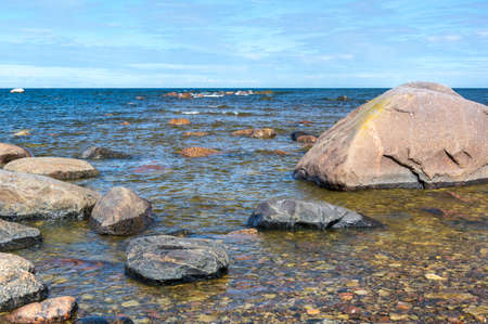 blue waves at seaside and rocksの写真素材