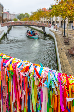 Colorful love ribbons on the bridge over portuguese venice in Aveiro Portugalの写真素材