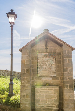 The light that illuminates the faith in the small chapel to stop and pray, Cortona - Italyの写真素材