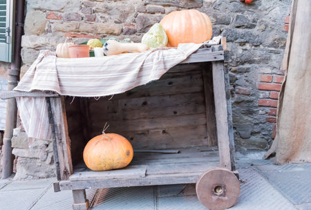 The wooden cart with fruit on display, Tuscany - Italyの写真素材