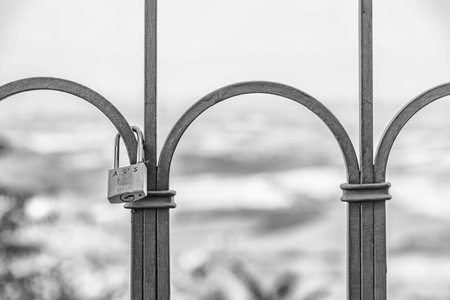 The padlock of love in the city of Montalcino, Tuscany - Italyの写真素材