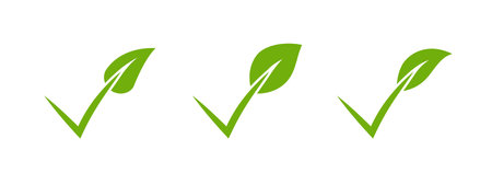A minimalistic green leaf icon with a check mark, symbolizing organic products, eco-friendly agriculture, and environmental sustainability, ideal for nature focused logos and stickers.のイラスト素材