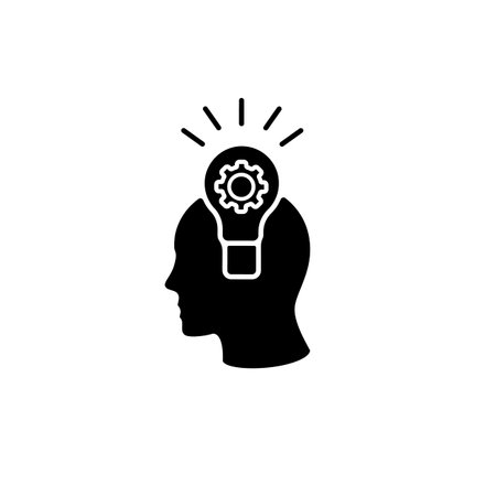 Black silhouette head with light bulb and gear, representing innovation, creativity, and new ideas.の写真素材