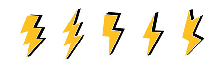 A collection of five bold yellow and black stylized lightning bolt shapes on a white background.のイラスト素材