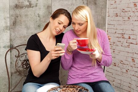 Women reading a text massage on a cellphone