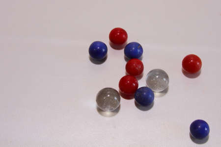 Red, white and blue marblesの写真素材