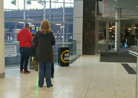 Mall customers pay for parking