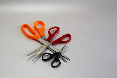 Three pairs of scissors of different sizesの写真素材