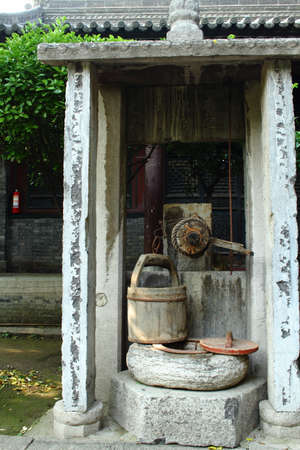 Ancient water well inside the Grand Mosque Xi'an Chinaのeditorial素材