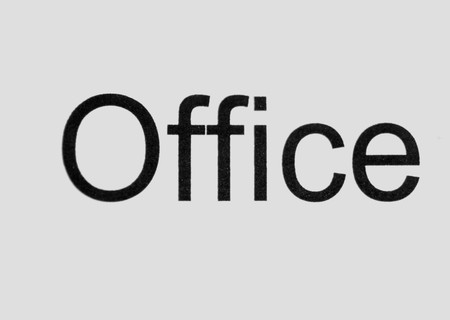 Office sign - black lettering on a white backgroundの写真素材