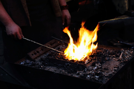 Irons in the fire - a blacksmith at work