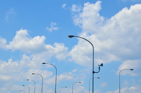 Street lights and blue skyの写真素材
