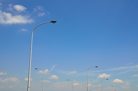 Street lights and blue skyの写真素材