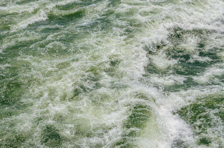 a violent river flowの写真素材
