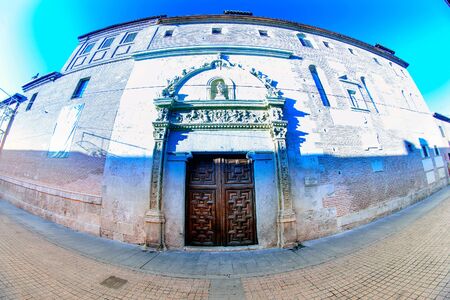 streets, monuments and old buildings of the town of Alcala de Henares, Spainの写真素材