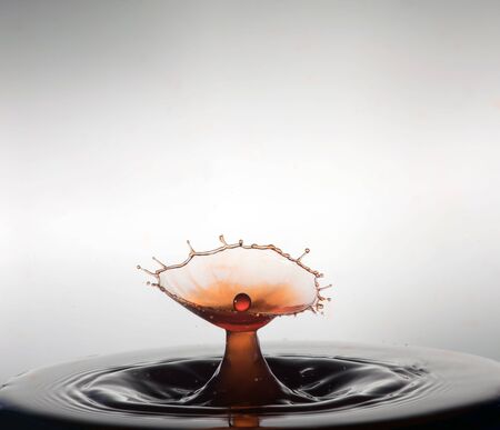 Falling drops of water. Splash effect after collision a falling drops with water Surface