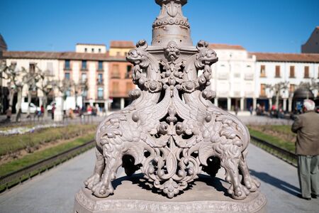 Alcala de henares, madrid, Spain-FEBRUARY 25, 2017. Detail of the foot of the lanterns in the Plaza de Cervantesのeditorial素材