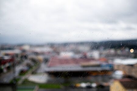 Drops of rain on the window (glass). Shallow DOFの写真素材