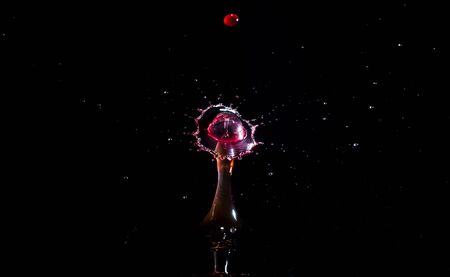 Images forming two drops of water when colliding after falling in water