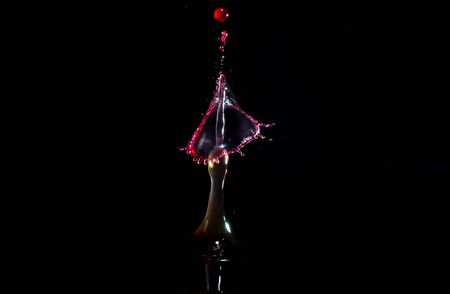 Images forming two drops of water when colliding after falling in water