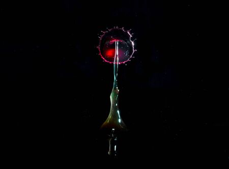Images forming two drops of water when colliding after falling in water