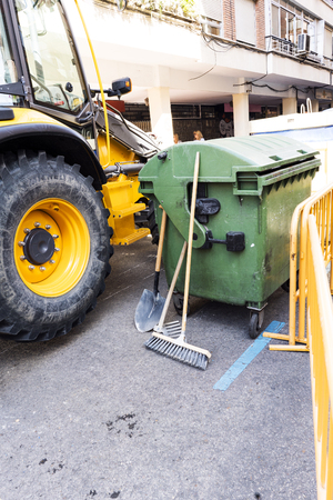 Images of works with backhoe in a small district of Alcalá de Henares. Spain