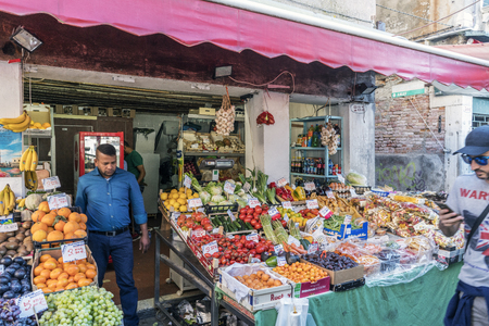 Venice, Veneto, Italy. May 21, 2017: Small fruit tree in the street called "Campo de la Pescaria"のeditorial素材