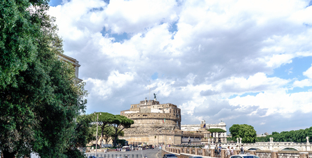 Rome, Lazio, Italy. May 25, 2017: Bridge over the river Arno called "San Angelo" full of people strolling, in the background the national museum of the castle of San Angelo and a blue sky with a cloud over the castleのeditorial素材