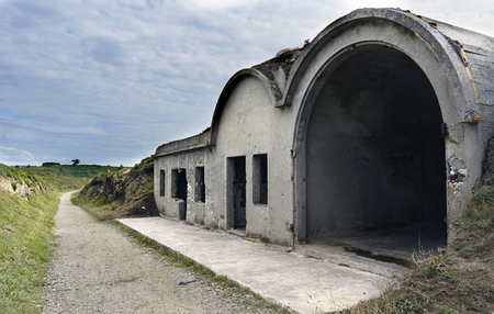 One of the old cement barracks for the garrison of the soldiers who protected the Atlantic coast of La Coruna from attacks from the seaの写真素材
