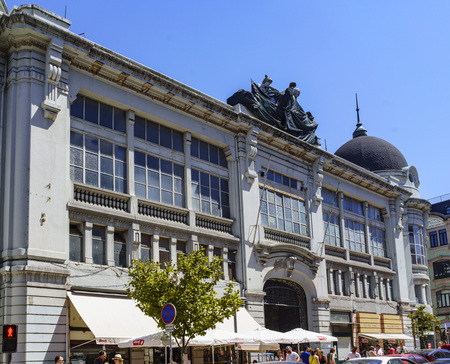 Facade of the famous market of foods, fruits and vegetables of Porto (Portugal) called "Mercado do Bolhao" in neoclassical style and very famous in the cityのeditorial素材