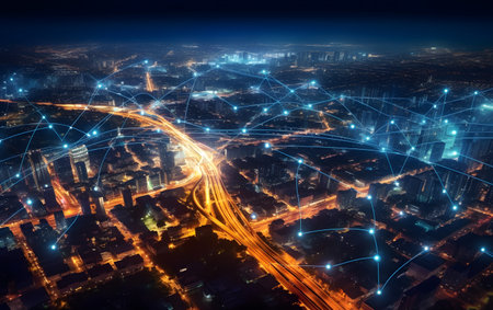 High-rise buildings and roads in the city at night. The concept of connection and communication.の素材